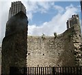 View of two of the Barbican Towers towering above the ruins of the London Wall from the area near the Barbican Estate #3