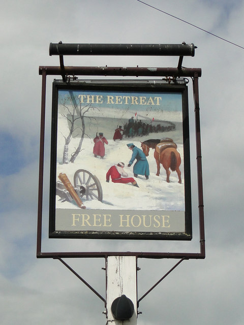 The hanging sign of 'The Retreat' public house