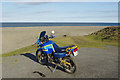 NX4604 : Motorcycle near Point of Ayre by Stephen McKay