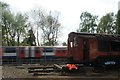 View of the L11 1927 Central line locomotive and 1992 stock side by side