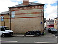 Black plastic bags awaiting collection from a Barry corner