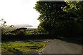 SN0438 : Junction on Ffordd Bedd Morus and view down to the coast by Christopher Hilton