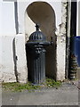 Water conduit head outside the former Trustee Savings Bank