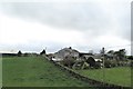 Farm house and outbuildings on the Lower Clay Road overlooking the A22