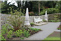 SH5573 : The restored wall, obelisks and seat at Plas Cadnant by Richard Hoare