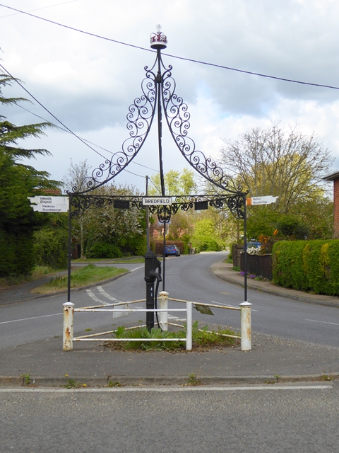 Village pump and signpost