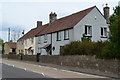 Houses on the A37 at Clutton