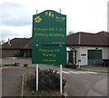 Green and yellow nameboard, Lydney