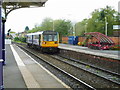 Train to Chester arriving in Altrincham