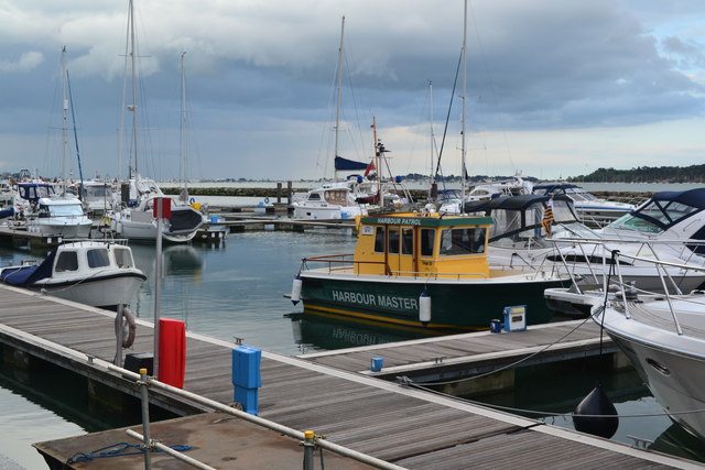 Boats at pontoons in marina at Poole