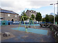 Swings in Weston Square playground, Barry