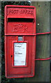 Close up, Elizabeth II postbox on Thorpe Road, Kirby Cross