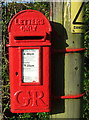 Close up, George V postbox on Heath Road, St Osyth Heath