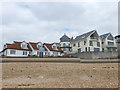 Sea defences in front of properties on Bowleaze Coveway