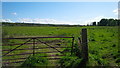 NH7045 : Gate and fields at Stratton Farm, Inverness by Alpin Stewart