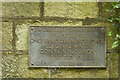 Plaque marking a 17th century well