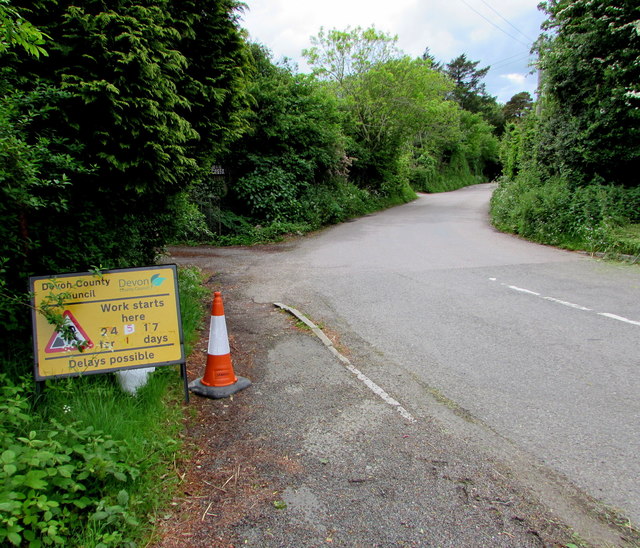 Yellow notice of impending roadworks, Trow, Devon 