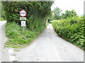 Unnamed lane signposted simply as "narrow road"