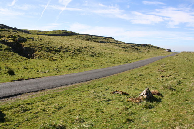 Moorland road into Langcliffe by Winskill Stones