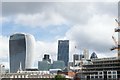 View of the Walkie Talkie, Tower 42 and Cheese Grater from the top deck of a City Cruises vessel "Millennium Time"