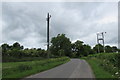 ST9898 : Wires over Tarlton Road north of Kemble by Jaggery