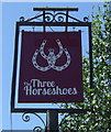 TL2334 : Sign for the Three Horseshoes public house, Norton by JThomas