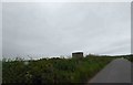 The stub of a disused windmill near Angle