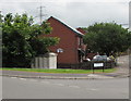 Electricity substation below a Llanfoist corner