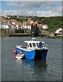 NZ7818 : Fishing boat in Staithes Harbour by Neil Theasby