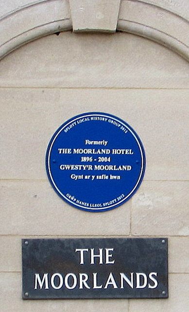 Blue plaque on the wall of the former Moorland Hotel, Splott, Cardiff