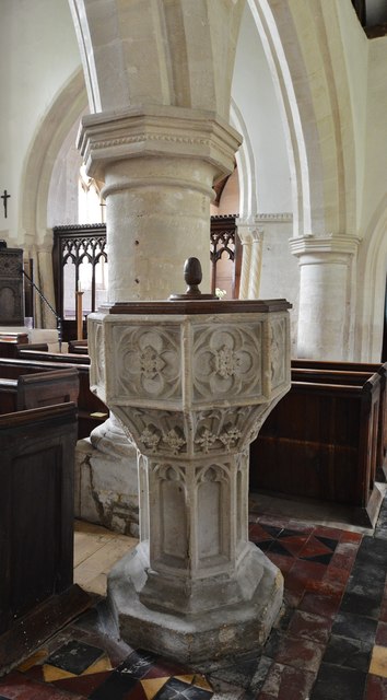 Windrush, St. Peter's Church: c15th octagonal stone font with quatrefoils in each face