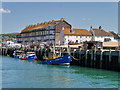 SY4690 : East Quay at West Bay Harbour by David Dixon