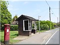 Post box and bus shelter by B1033