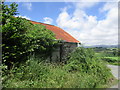 Sied to sinc / A zinc-roofed shed