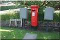 Pillar box and grey postal boxes, Kirkhouse Road