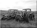 NU0546 : Old Tractors Near Cheswick Sands by James T M Towill