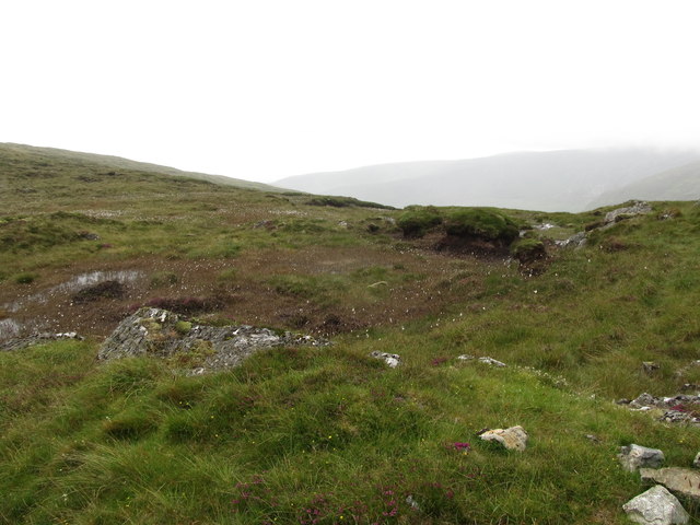 Boggy tracts and rock outcrops on the col between the two Pigeon Rock Mountain summits