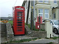 Elizabeth II postbox and telephone box on Trevenner Square, Marazion