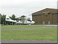 TL4646 : Catalina and Hangar 2 at Duxford by M J Richardson