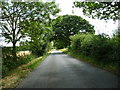 Finningham Road heading east to a 63 metre spot height