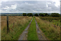 Track heading South towards the Whitebirk Industrial Estate