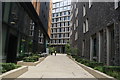 View up one of the alleys into Pancras Square from Pancras Road