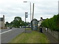 SK3941 : Morley Smithy, bus stop, milepost and pub by Alan Murray-Rust