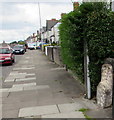 Pavement and old milestone on the east side of Newport Road, Rumney, Cardiff