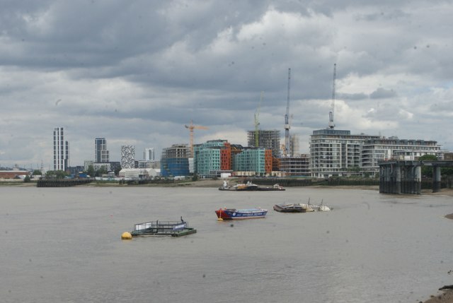 View of several new blocks of flats under construction on the Greenwich riverside from the Thames Path