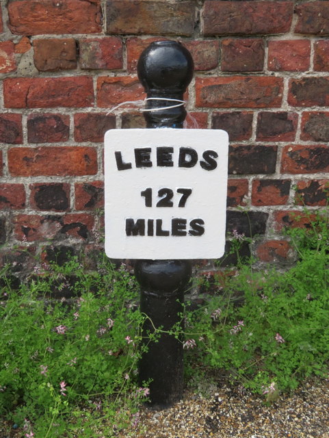 Old milemarker by Barmouth Way - 127 miles to Leeds