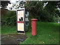 Elizabeth II postbox and telephone box on Bulwark Road, Helston