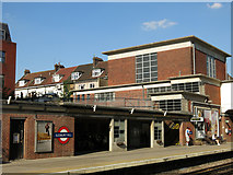 TQ1585 : Sudbury Hill tube station - eastbound platform and entrance building (rear) by Mike Quinn