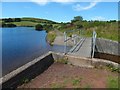 NS2774 : Whinhill Reservoir: footbridge over outflow by Lairich Rig