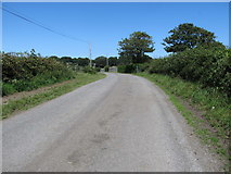 J6350 : View North towards a bend in the Quintin Bay Road by Eric Jones